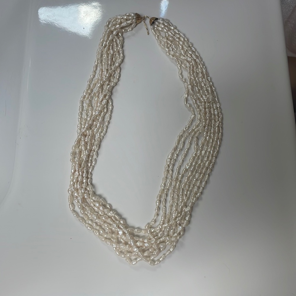 Gorgeous nine strand biwa pearl necklace.